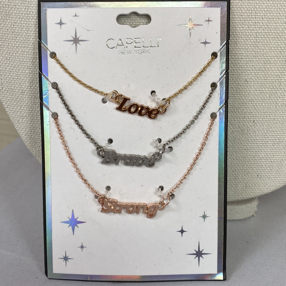 Set of three Love Brave Strong necklaces
